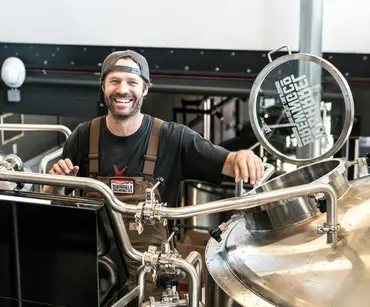 Male Brewery employee smiling